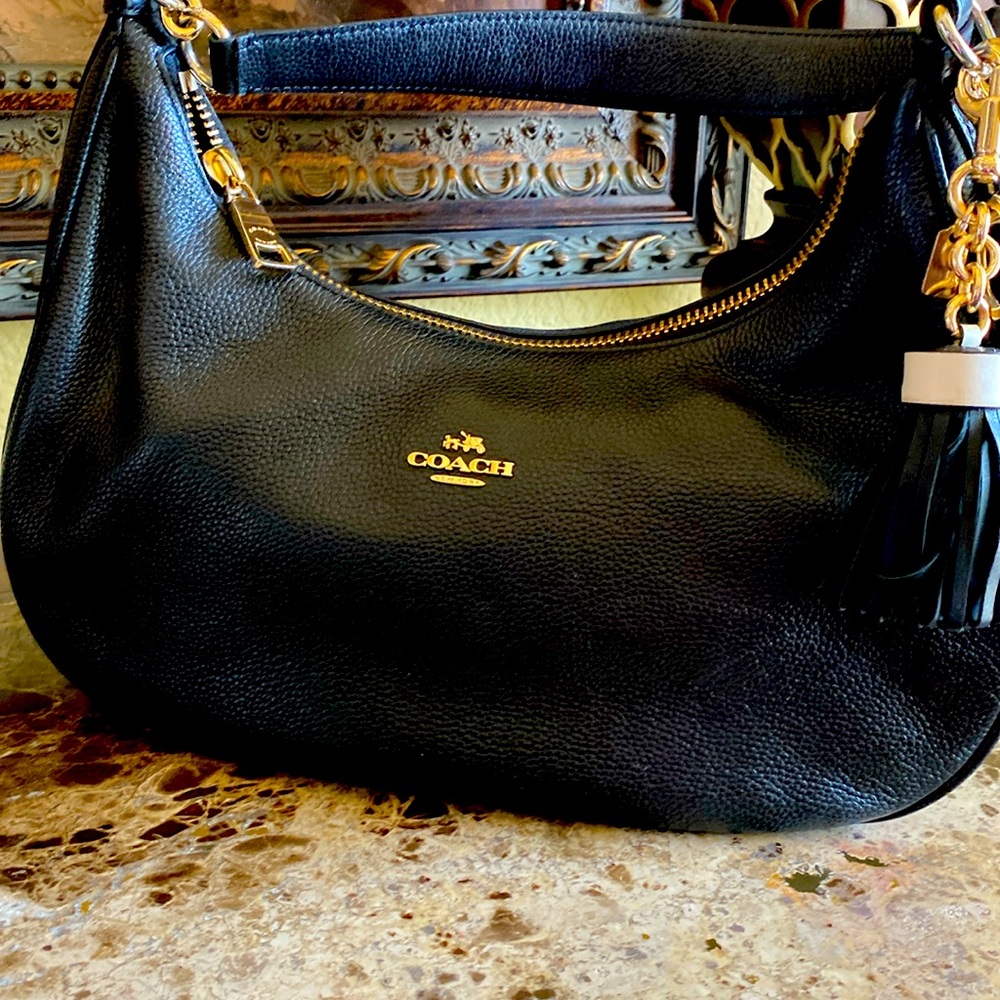 Coach black leather handbag with gold accents